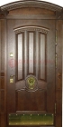 Входная арочная дверь с декоративным элементом ДА-23