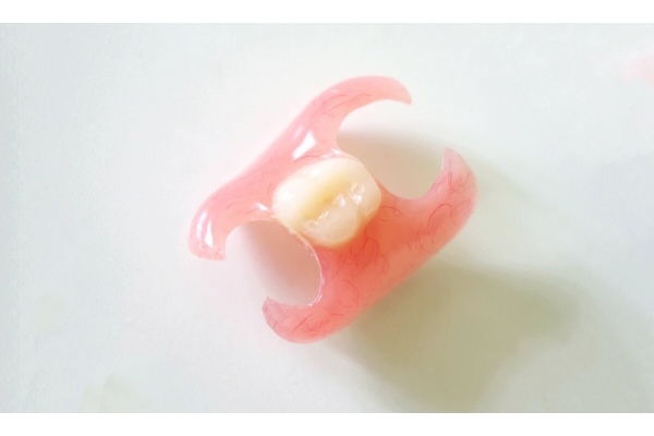 Зубной протез бабочка