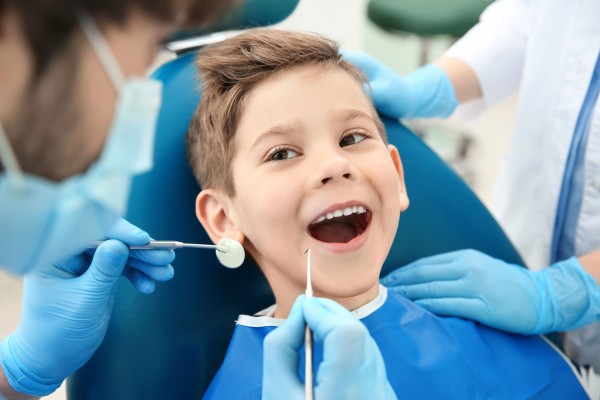 Как  приучить ребенка ходить к стоматологу?