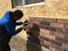 Косметический ремонт фасада облицованного камнем